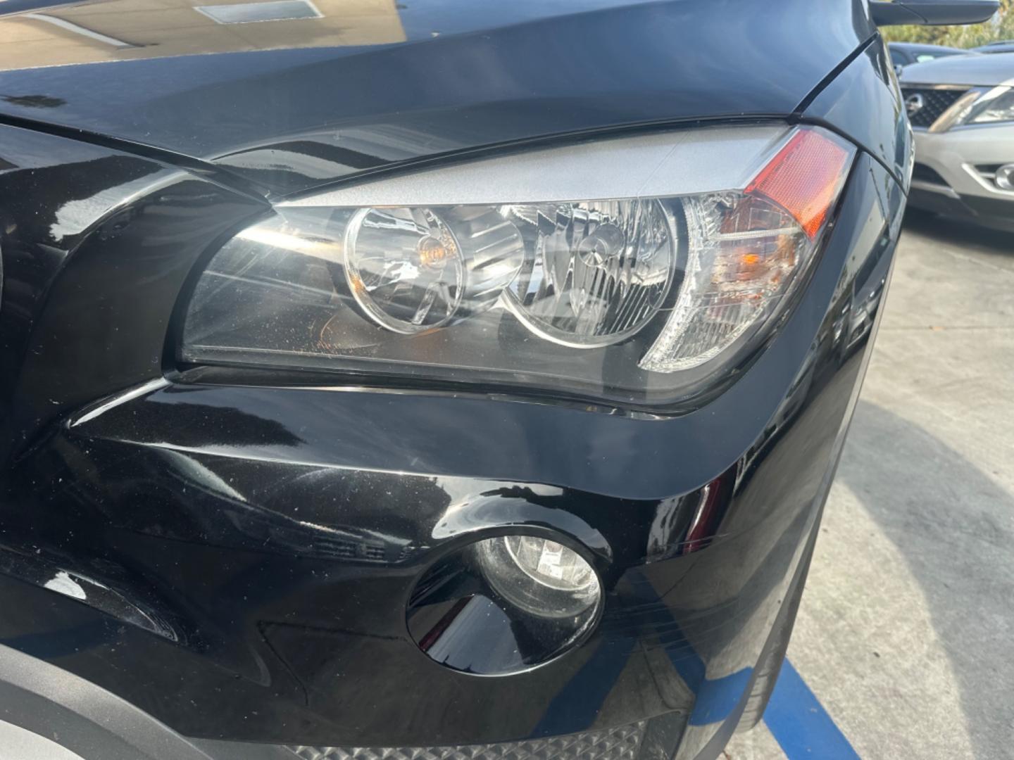 2014 Black /Black BMW X1 (WBAVM1C57EV) with an 4 CYLINDER engine, Automatic transmission, located at 30 S. Berkeley Avenue, Pasadena, CA, 91107, (626) 248-7567, 34.145447, -118.109398 - Photo#8